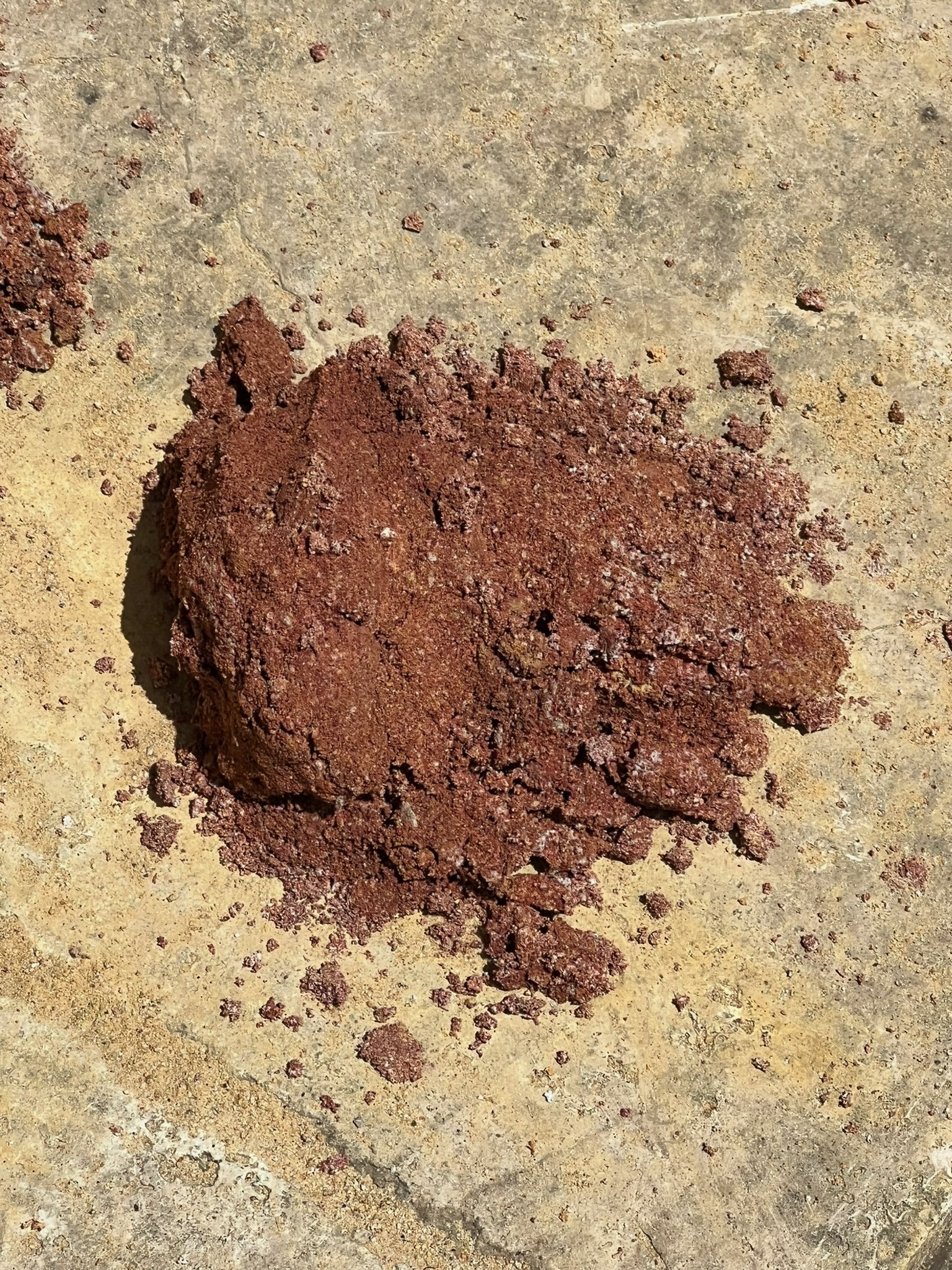 Grey earth pigment on stone